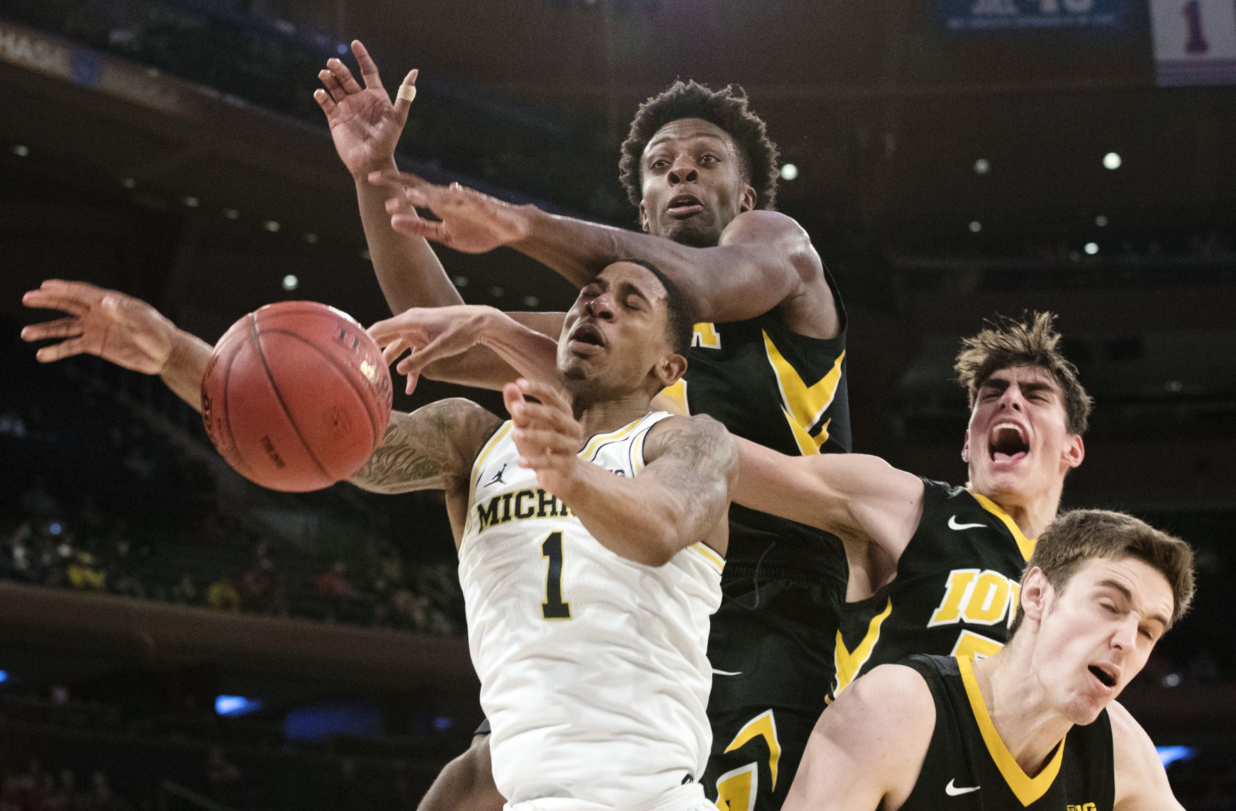 APTOPIX B10 Iowa Michigan Basketball